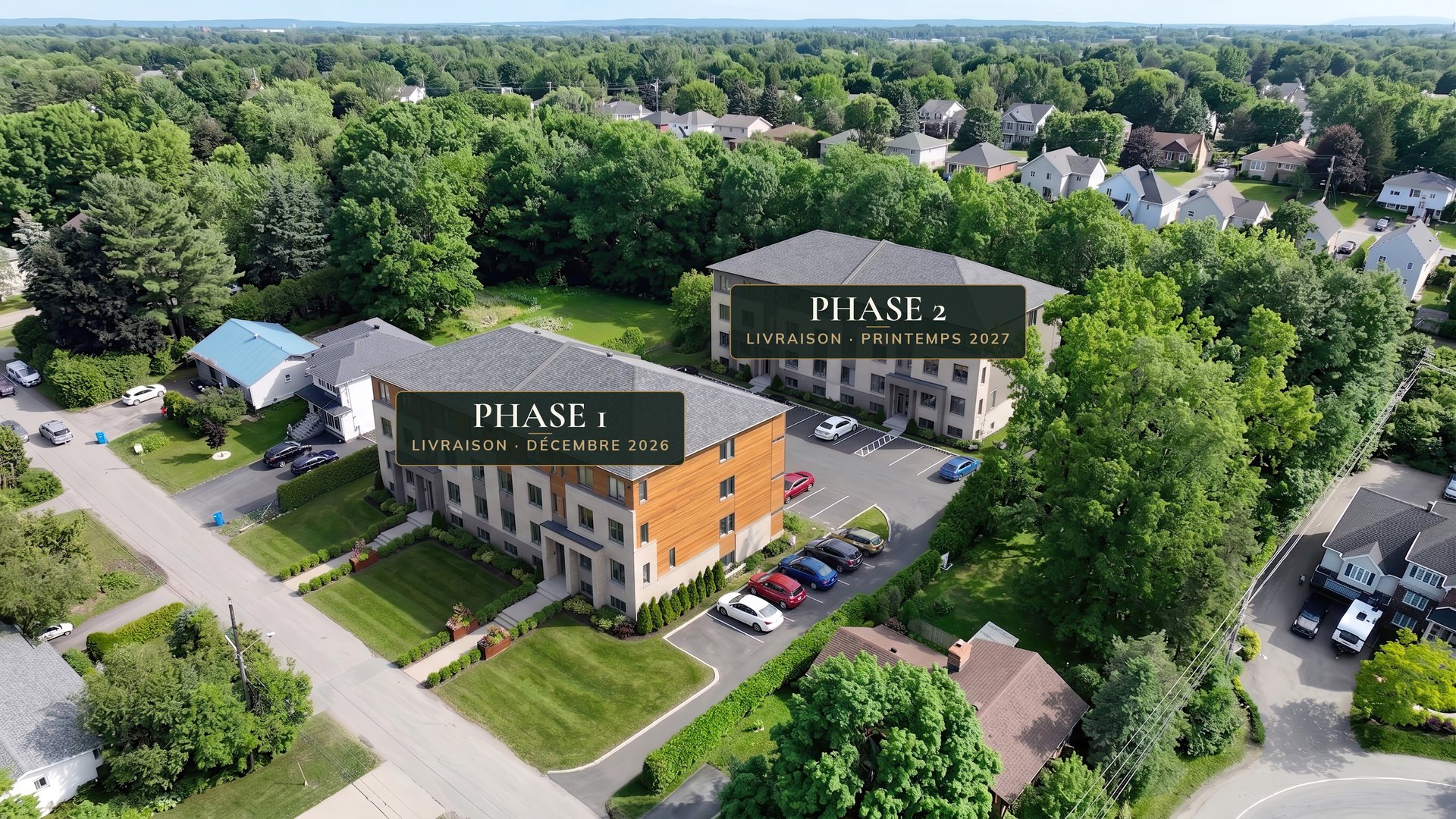 Aerial of the two buildings: Phase 1 (delivery December 2026) at front, Phase 2 (delivery spring 2027) behind